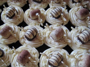 Vanilla cupcakes with buttercream icing and chocolates.....by Nicola Becci